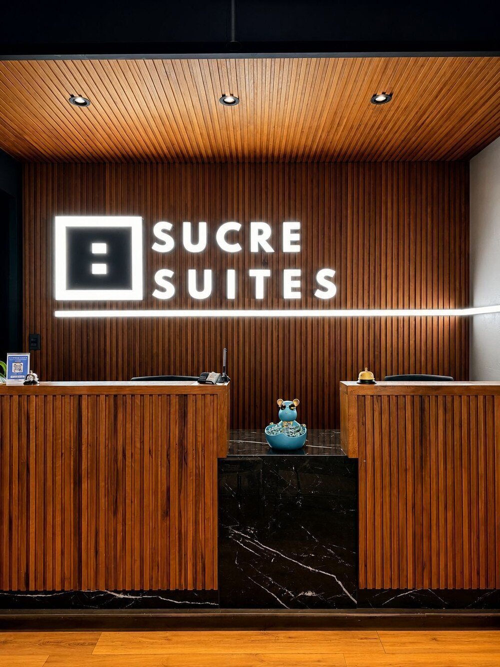 Reception desk with a wooden panel design